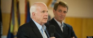 Oct. 28, 2012 - Tucson, Arizona, U.S - Sen. JOHN McCAIN (R-Ariz.), left, campaigned for Rep. JEFF FLAKE (R-Ariz.), right, at a Veterans of Foreign Wars chapter house in Tucson, Ariz. McCain accused President Obama of either dereliction of duty, lying to