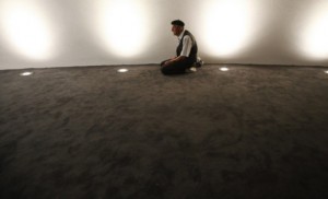A Muslim man prays inside a new mosque in Rijeka