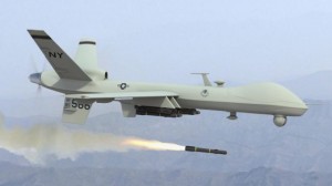 A US Predator drone fires a Hellfire missile.