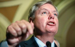 FILE - In this Nov. 29, 2011, file photo Sen. Lindsey Graham, R-S.C. speaks to reporters following a Republican policy meeting on Capitol Hill in Washington. Lawmakers who came to Washington demanding budget cuts face a tough test now that President Barack Obama and military leaders want to shrink the force, shut down bases and cancel weapons to achieve them. "It's funny that we want to save money everywhere except when it can bother us," Graham, a member of the Armed Services Committee, said in an interview. He's one of the few lawmakers who favors another round of domestic base closings. (AP Photo/Manuel Balce Ceneta, File)