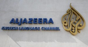 The logo of Qatar-based Al Jazeera satellite news channel is seen in Doha