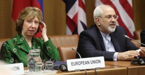 European Union foreign policy chief Ashton and Iranian Foreign Minister Zarif smile at start of talks in Vienna
