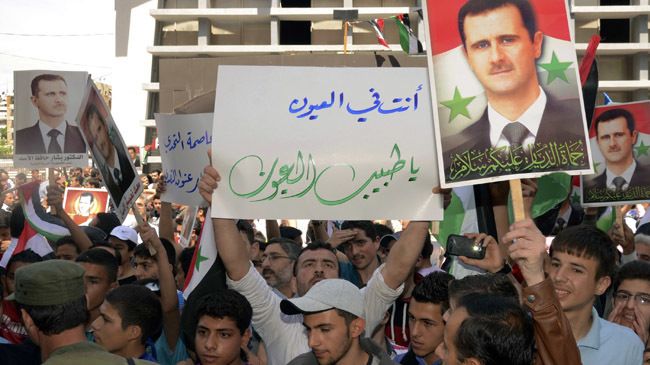 Supporters of president Bashar-al-assad