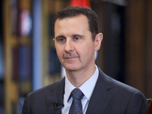 Syria's President Bashar al-Assad speaks during an interview with Venezuelan state television TeleSUR in Damascus