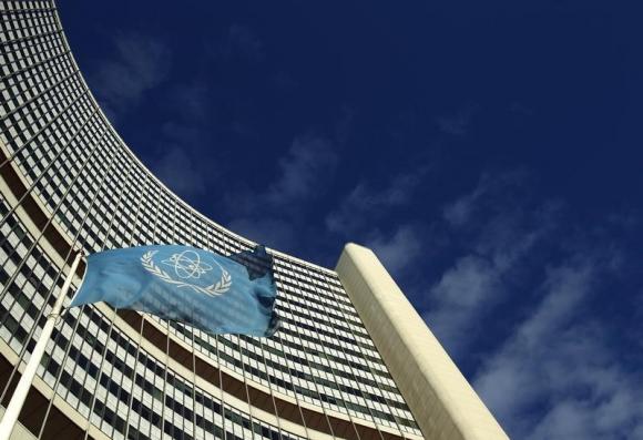 The flag of the International Atomic Energy Agency IAEA flies in front of its headquarters during a board of governors meeting in Vienna