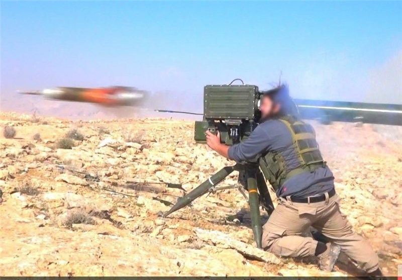 ISIL Takfiri militant shooting dead Iraqi people