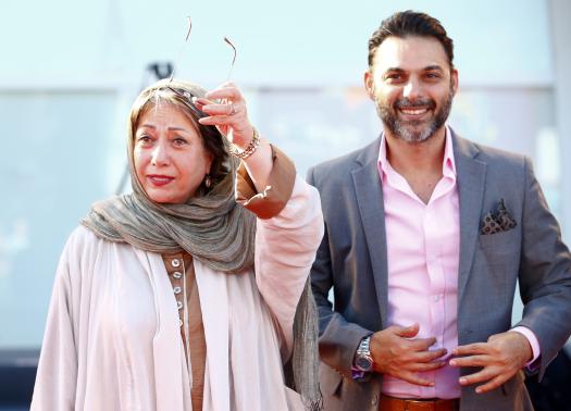 Director Banietemad and actor Moadi arrive at the red carpet for the movie "Ghesseha (Tales)" at the 71st Venice Film Festiva