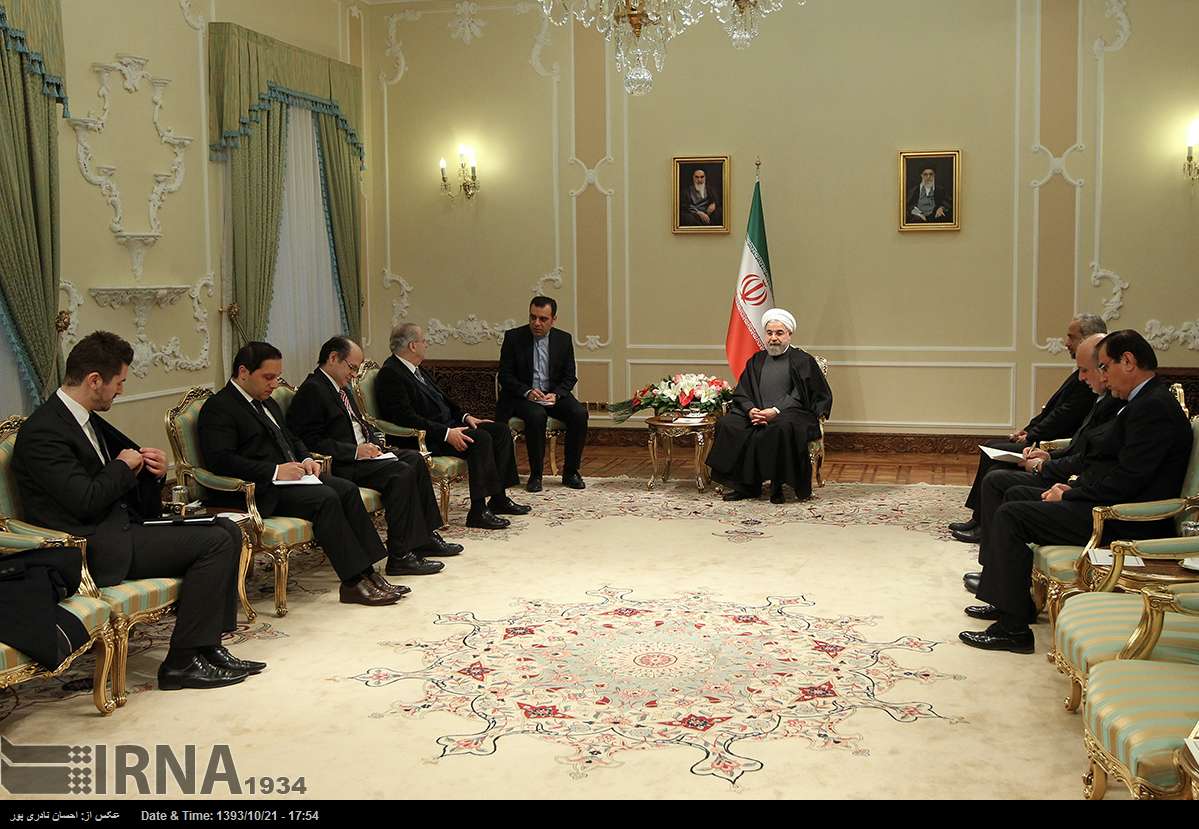 Ioannis Kasoulides and hassan rouhani in tehran