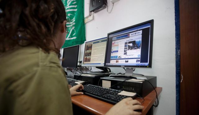An illustrative photo of a Unit 8200 intelligence soldier at work. Photo by Moti Milrod