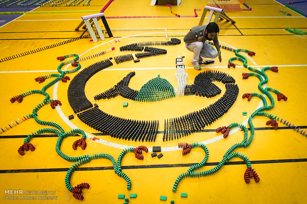 Dominoes toppled on occasion of Islamic Revolution anniv.