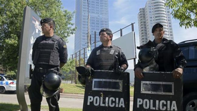 Security forces stand guard near the World Trade Center office complex in Montevideo, Uruguay, on January 8, 2015.