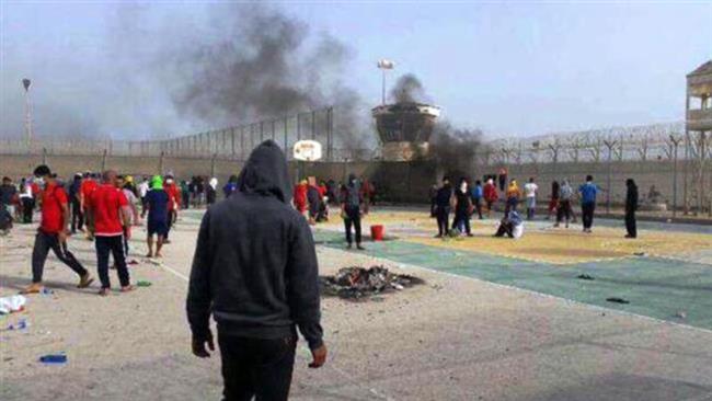 Security forces attacking inmates inside Bahrains Jaw prison, March 10, 2015.