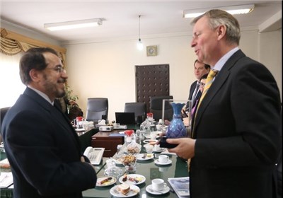 head of the Center for Interreligious Dialog and Civilization from the Islamic Culture and Relations Organization (ICRO), Ali Mohammad Helmi meets Austrias Ambassador to Iran Friedrich Stift in Tehran on February 28, 2015.