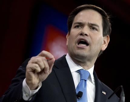 FILE - In this Feb. 27, 2015 file photo, Sen. Marco Rubio, R-Fla. speaks in National Harbor, Md. Eying the Republican presidential nomination, Rubio said March 17 he would "absolutely" defy stalwart European allies if necessary to revoke any Iranian nuclear deal he might inherit from President Barack Obama. In an interview with The Associated Press, Rubio said the next U.S.