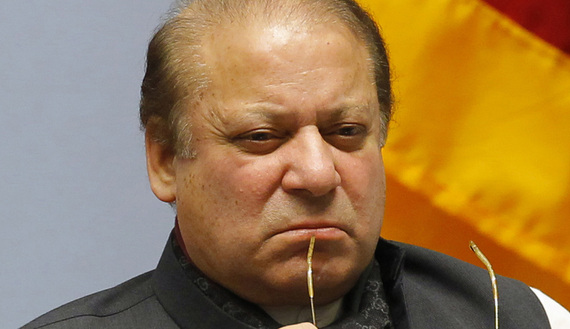 Pakistani Prime Minister Nawaz Sharif, who recently visited Saudi Arabia, appears to be thinking hard as he holds his glasses at the closing session of the 18th South Asian Association for Regional Cooperation summit in Katmandu, Nepal, Nov. 27, 2014. (photo by REUTERS/Niranjan Shrestha)