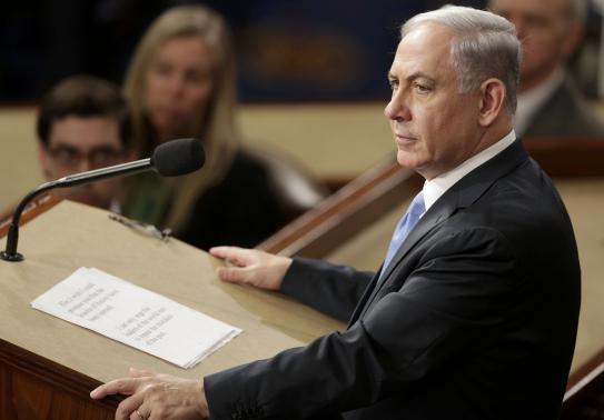 Israeli Prime Minister Benjamin Netanyahu (R) addresses a joint meeting of Congress in the House Chamber on Capitol Hill in Washington, March 3, 2015.
